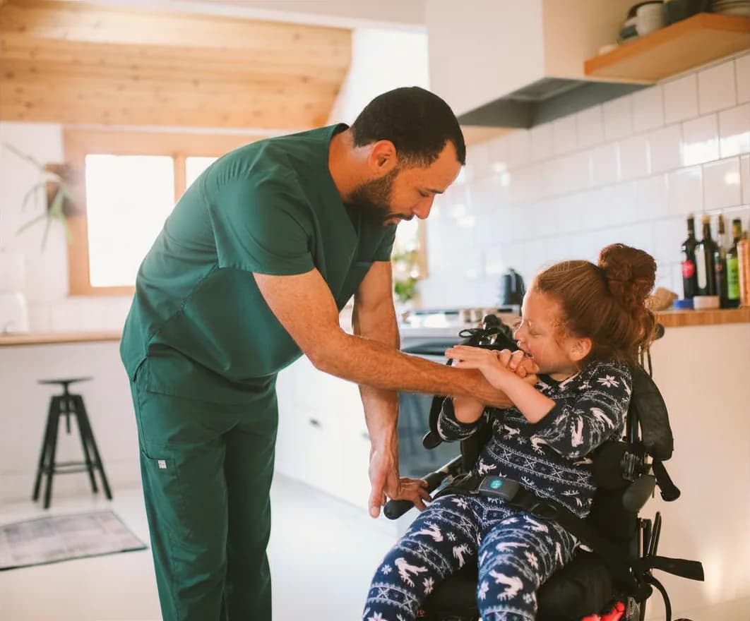 Therapist engaging a child in developmental activities